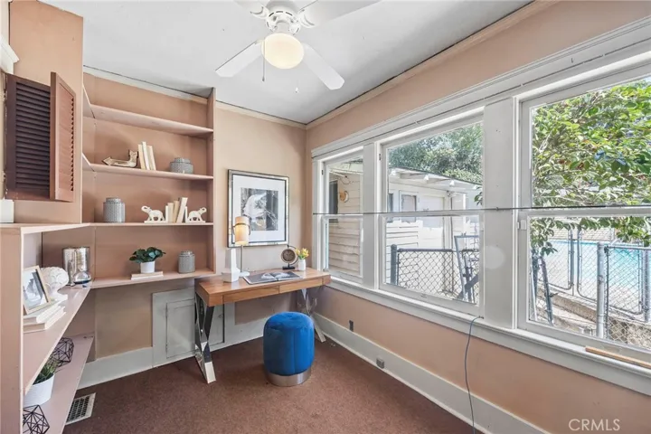 Downstairs Sunroom/Office/Gym or ready to be made into a Laundry Room