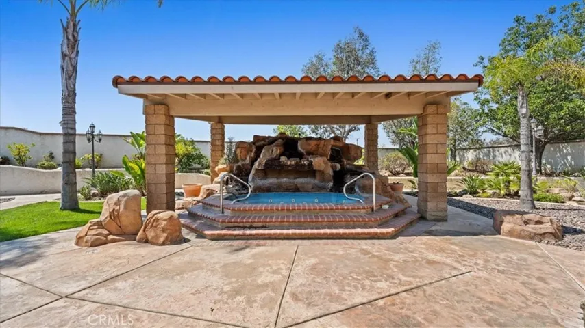 Backyard, private Jacuzzi, with rock Grotto-Style water Fall