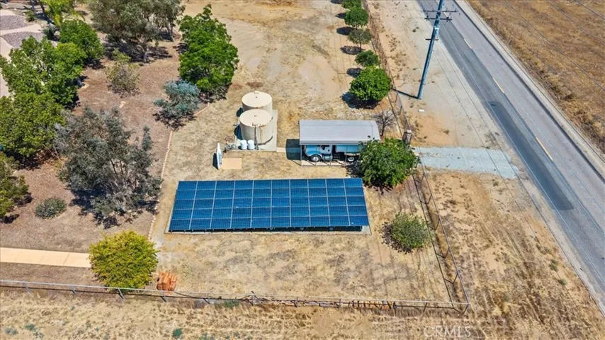 Drone Shot 4, Solar array, 2 2500 gallon tanks - Water Storage, Covered RV Parking