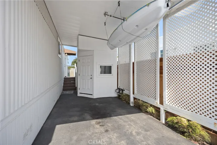 COVERED CARPORT WITH STORAGE