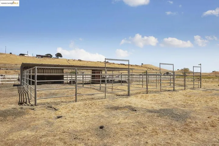 Stable featuring a view of countryside