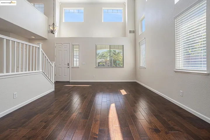 Healthy amount of natural light, engineer hardwood flooring, and a high ceiling