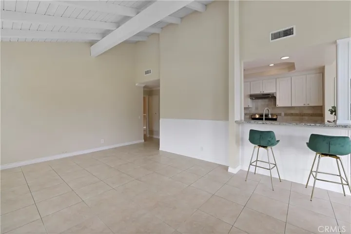 Open concept kitchen with countertop seating.