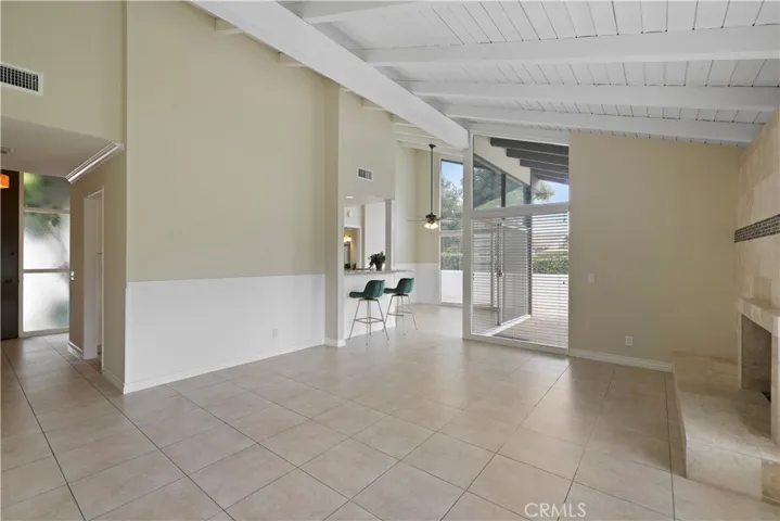 Living room looking towards the entry and dining room.