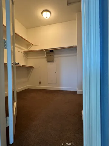 Walk-in closet in the Primary Bedroom.