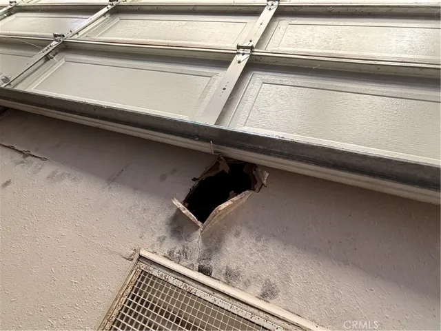 Hole in garage ceiling