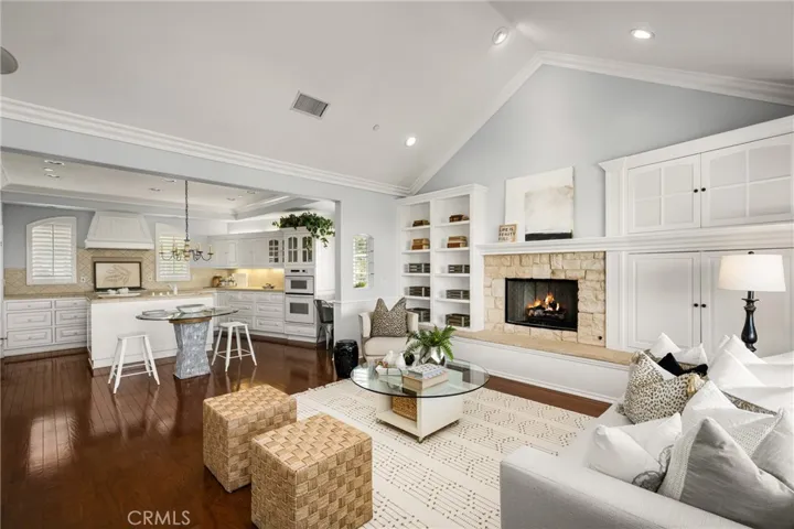 Gleaming hardwood floors continue into the kitchen.