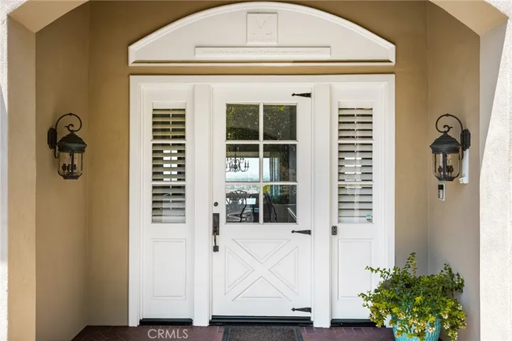 Dazzling views await from your handsome covered entry!