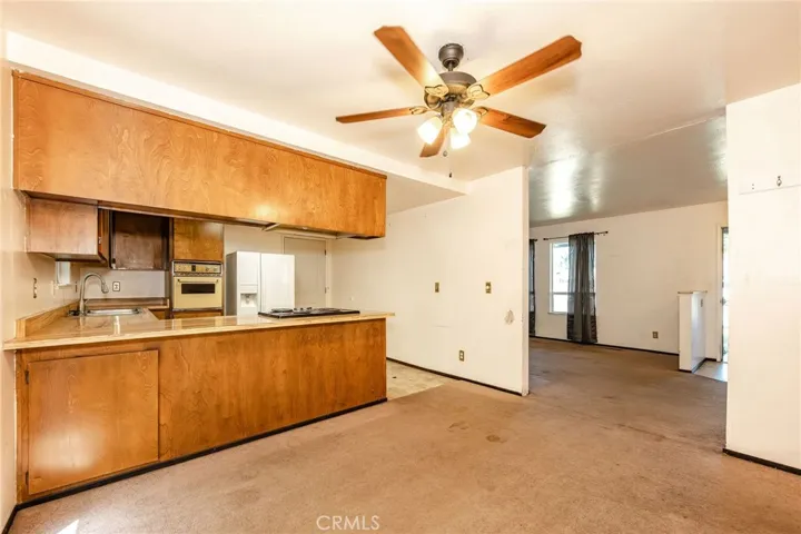 Dining looking toward kitchen and living rooms
