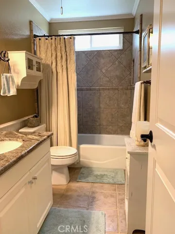 Hall bathroom with tub/shower.