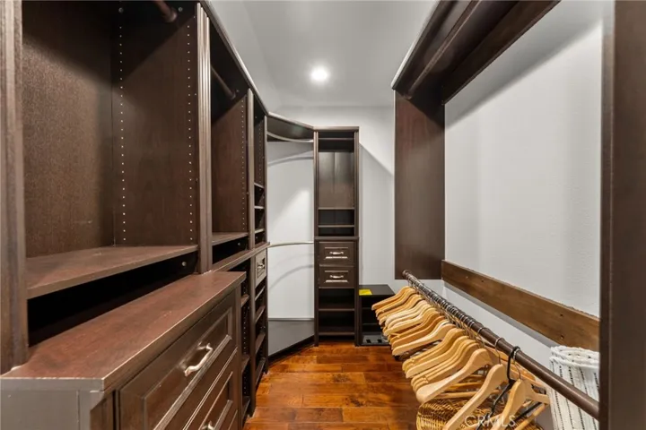 Upstairs primary walk-in closet