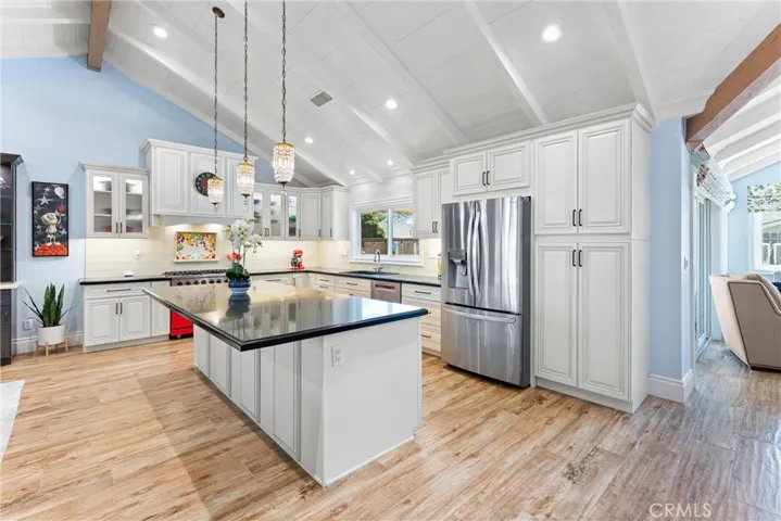 Island with pendant lights, perfect for everyday living and entertaining