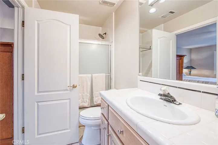 Upstairs jack and jill full bathroom with access from bedroom 3 and upstairs hallway