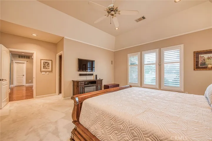 Primary suite displaying entry door and access door to parlor room