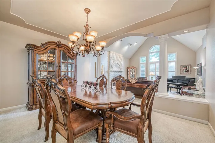 Formal dining room with entry to kitchen