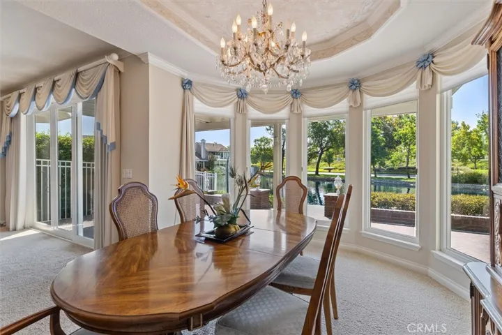 Entertain in your dining room with a view of the lake.
