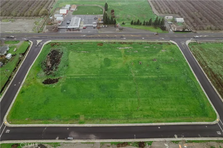 4 stop signs, curb, gutter, electrical, sewer & water stubbed in