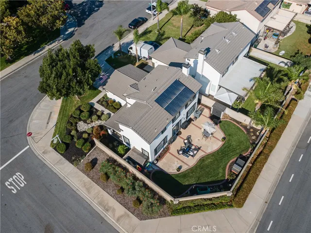Aerial photo of the house with drought-tolerant plants, and attractive backyard.