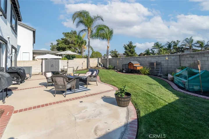 Spacious backyard with new irrigation system & sprinklers.