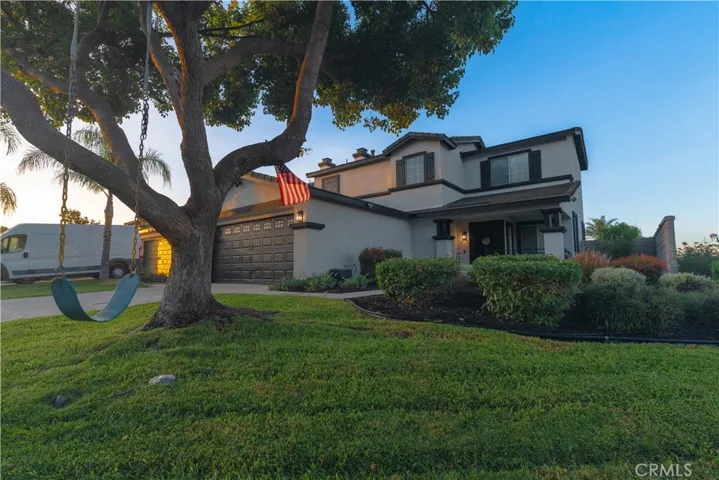 Corner lot gem with a gorgeous tree in the well-maintained front yard.