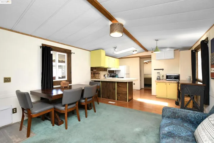 Dining space with light wood finished floors