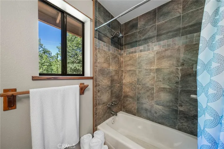 Upstairs hall bath tub/shower combo
