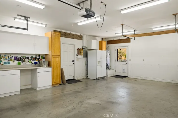 Extra refridgerator in garage.