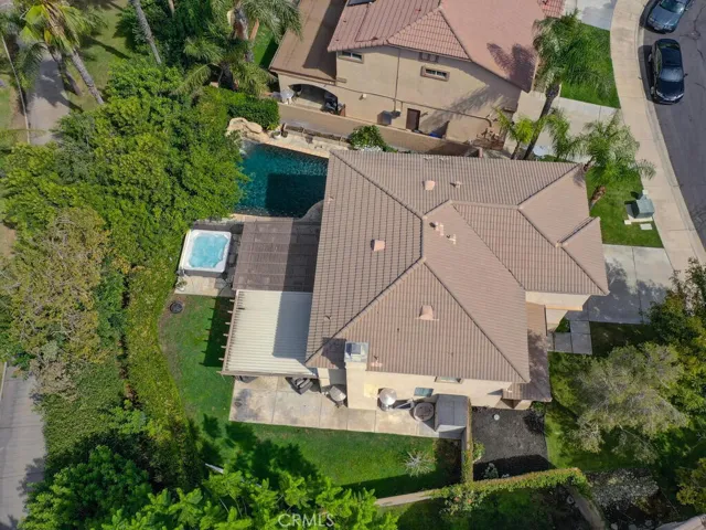 Overhead view of spa and side yard with grassy area
