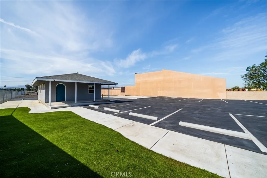 artificial turf sidewalk and concrete around perimeter of office