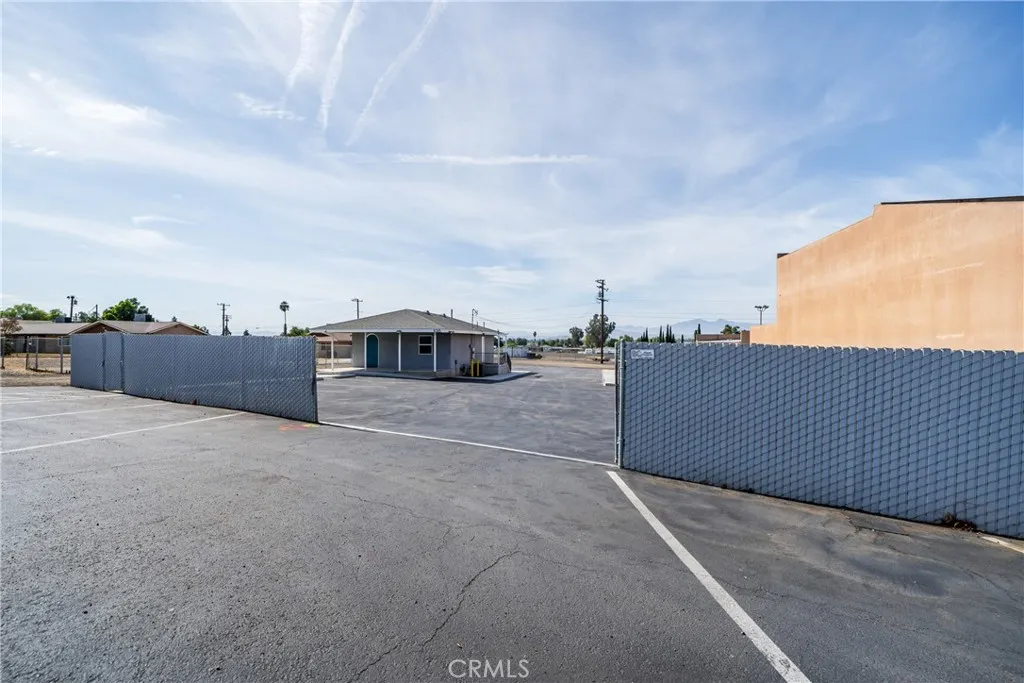 fenced entrance to office and property