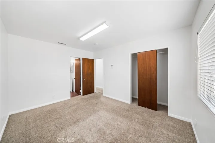 Bedroom 2 with entrance to master bath