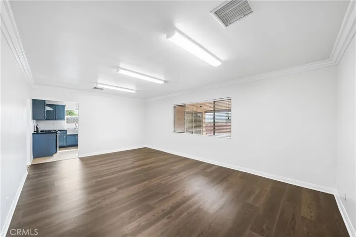 Living room opening to kitchen