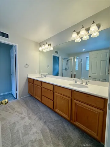 Soaking tub, walk in closet and dual vanities.