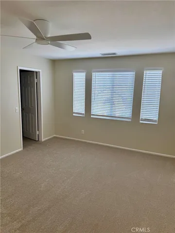 Owner's suite looking towards the walk in closet.
