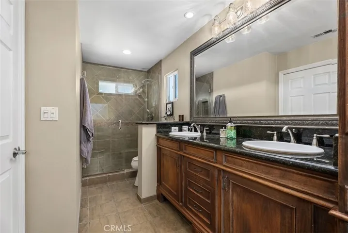 Upstairs Primary Bath facing shower