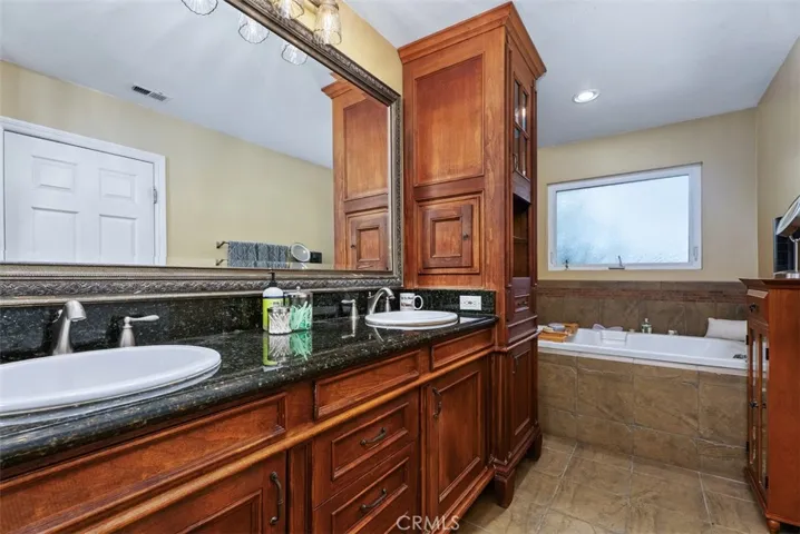 Upstairs  Primary Bath facing tub