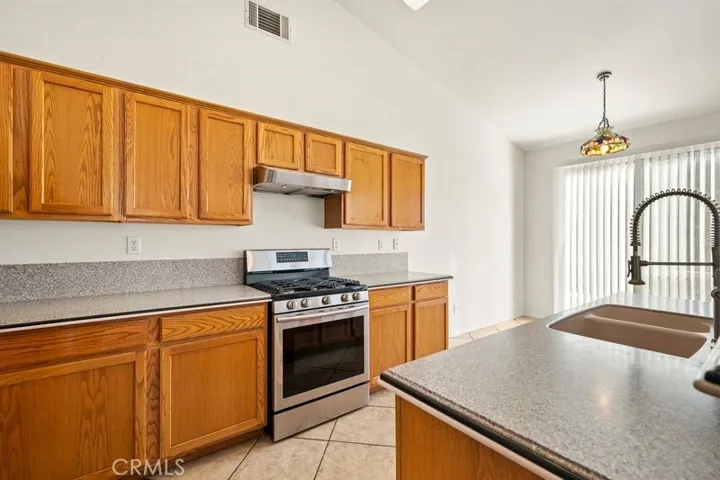 Kitchen with stainless steel appliances.