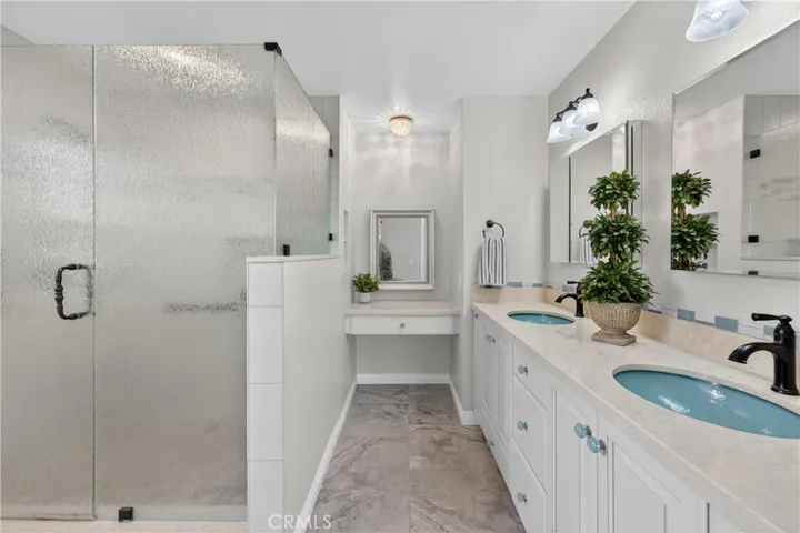 Dual sinks and separate vanity