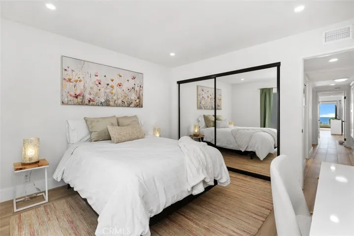 Secondary bedroom with front patio access.