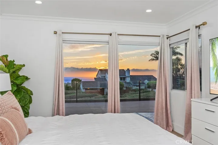master bedroom with sunset ocean view