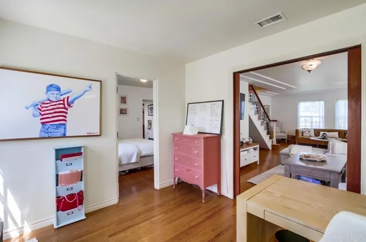 View toward 2nd Downstairs BR and to the LR; backyard access is to the left