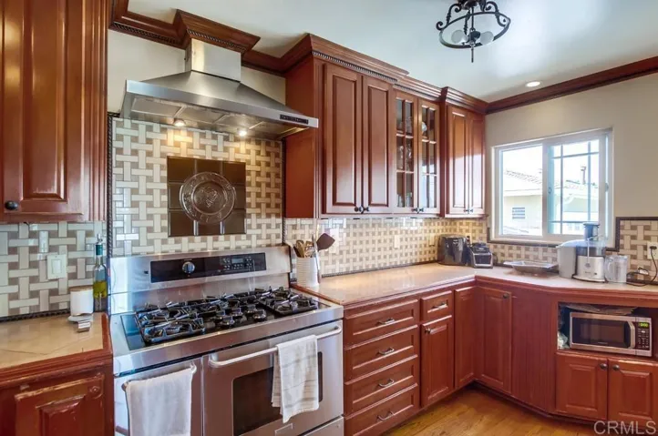 Great Kitchen with beautiful countertops, cabinets, and SS Appliances