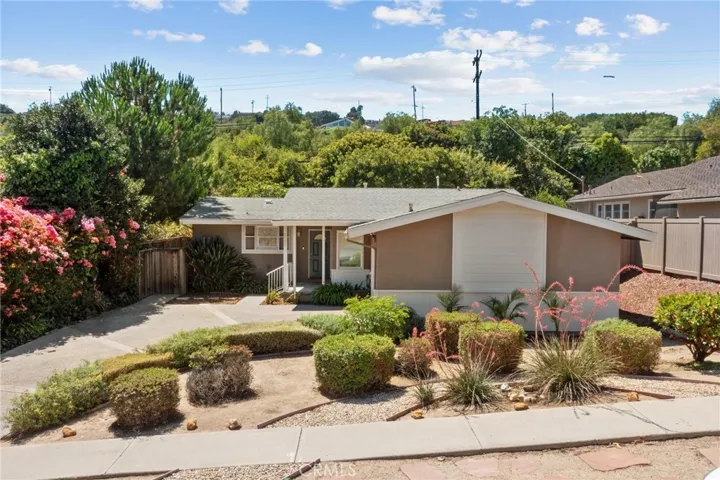 Curb appeal is on point at this darling home!