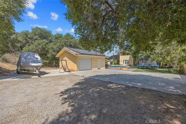 RV parking with access road and second detached garage