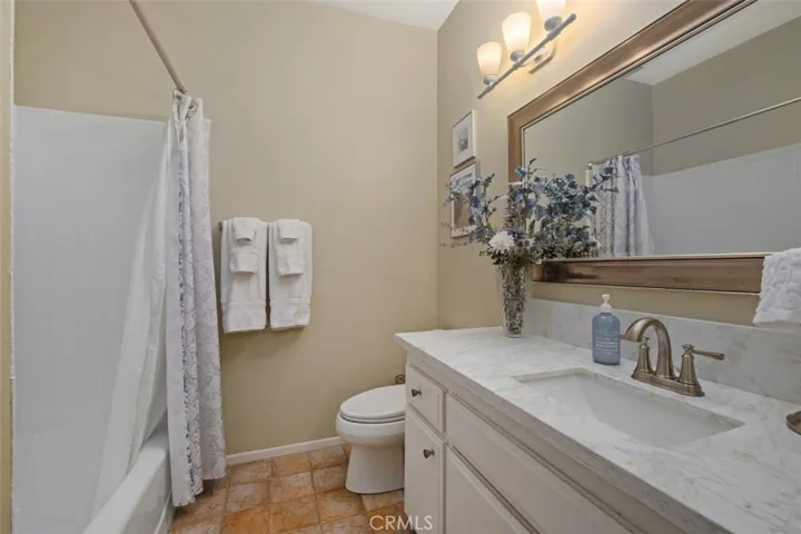 Nicely updated hall bath.
