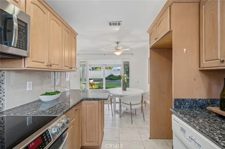 Featuring updated countertops & appliances, lending a clean, modern flair