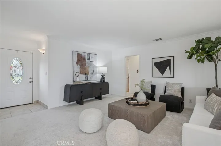 Step inside to find a spacious living area illuminated with natural light