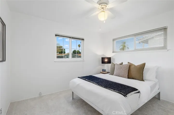 Perfectly sized bedroom w/ dual windows & ceiling fan~ providing plenty of natural air