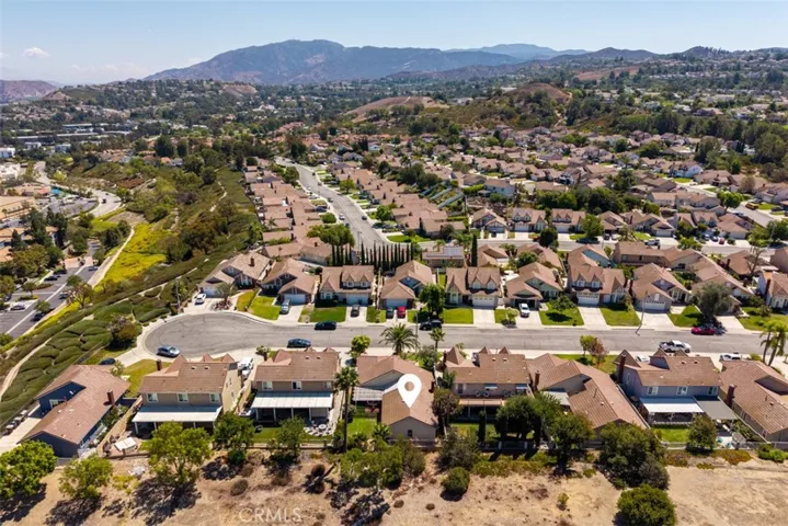 Aerial view of the house and community