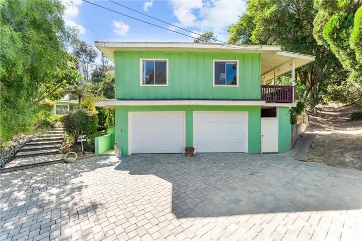 2 car garage and guest house above